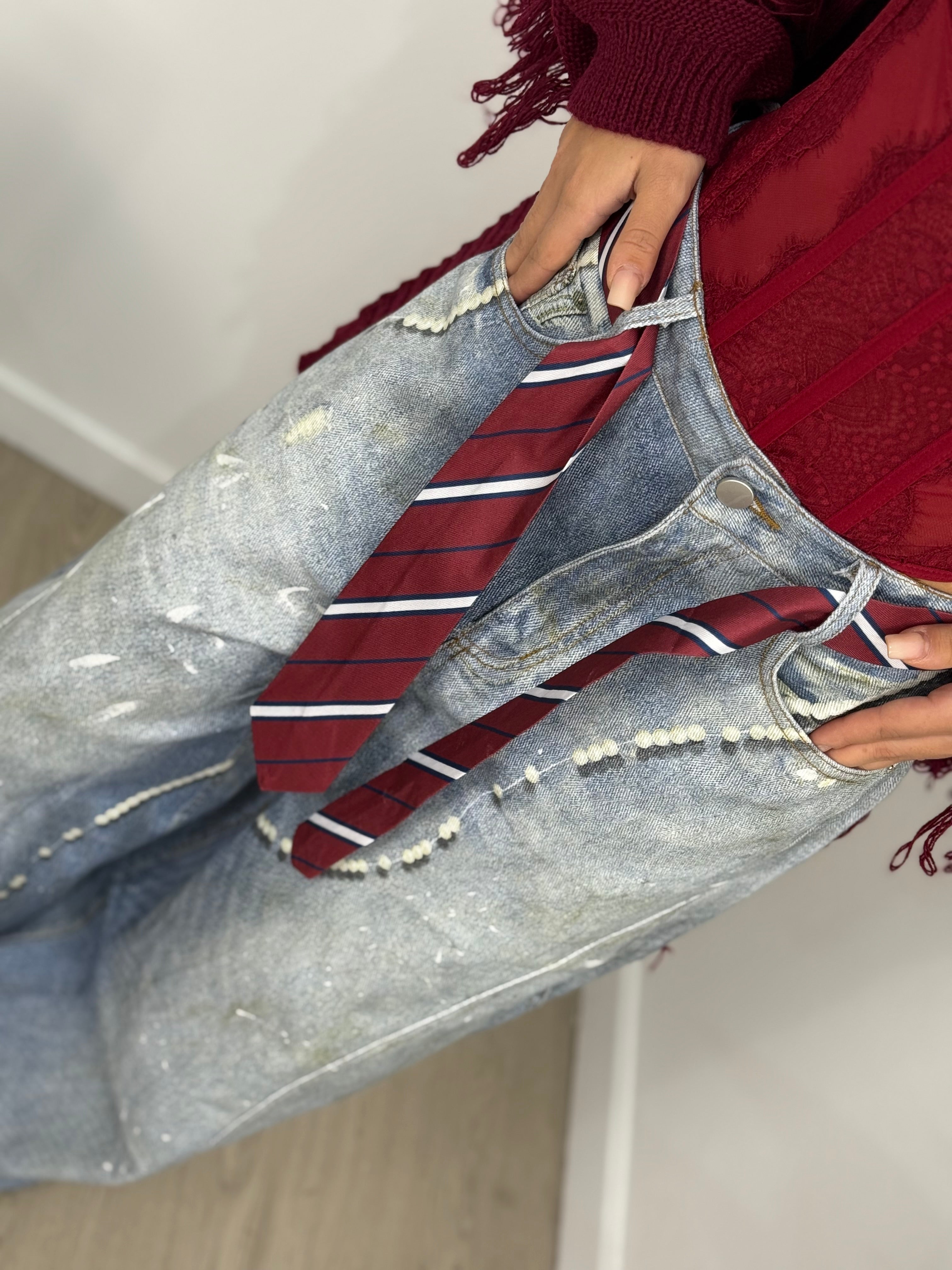 Jeans stampa con cinta cravatta