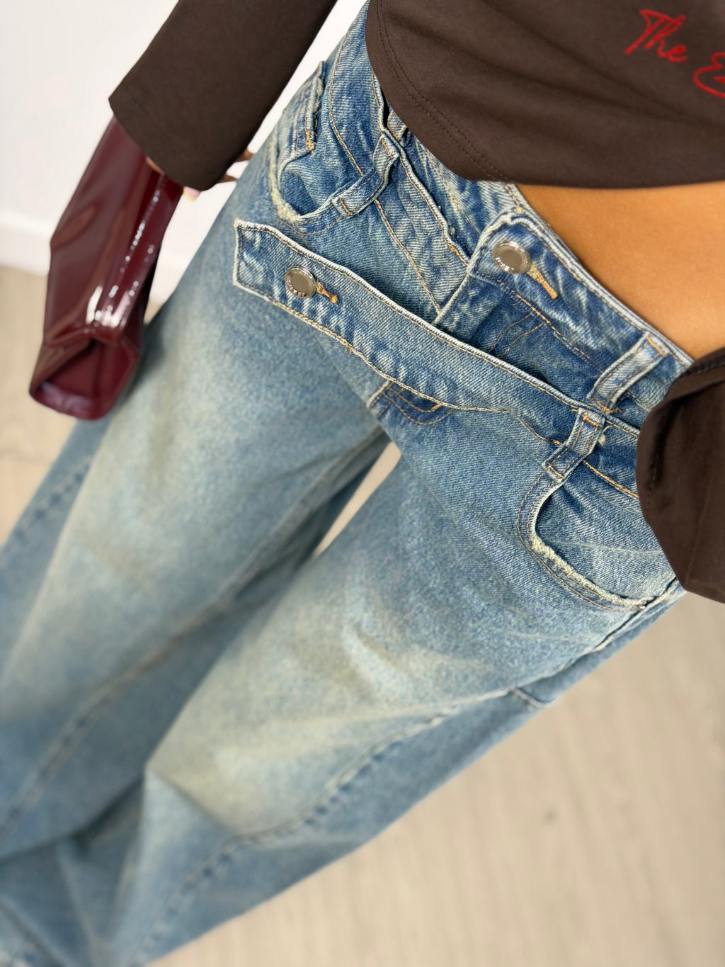 Jeans doppia fibbia